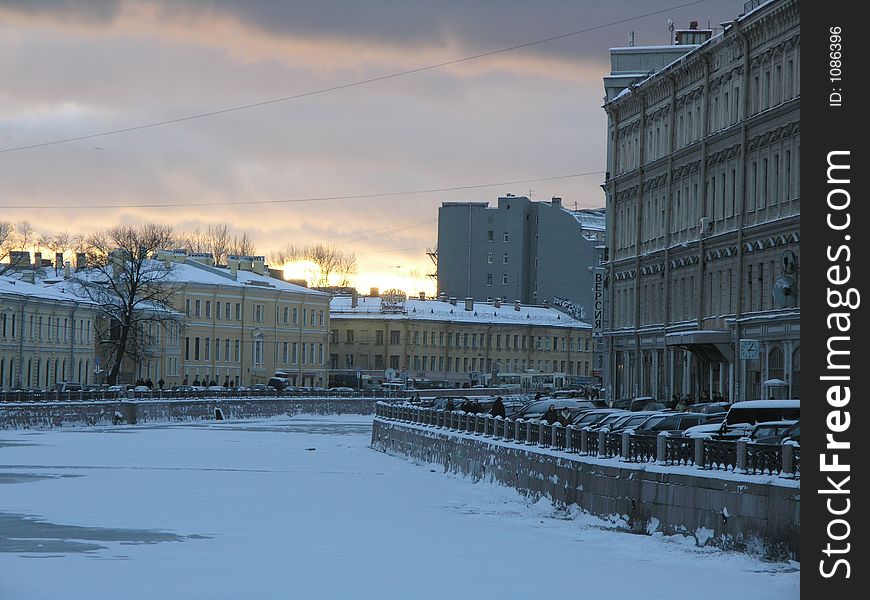 Sunset over Moika river in winter Saint-Petersburg