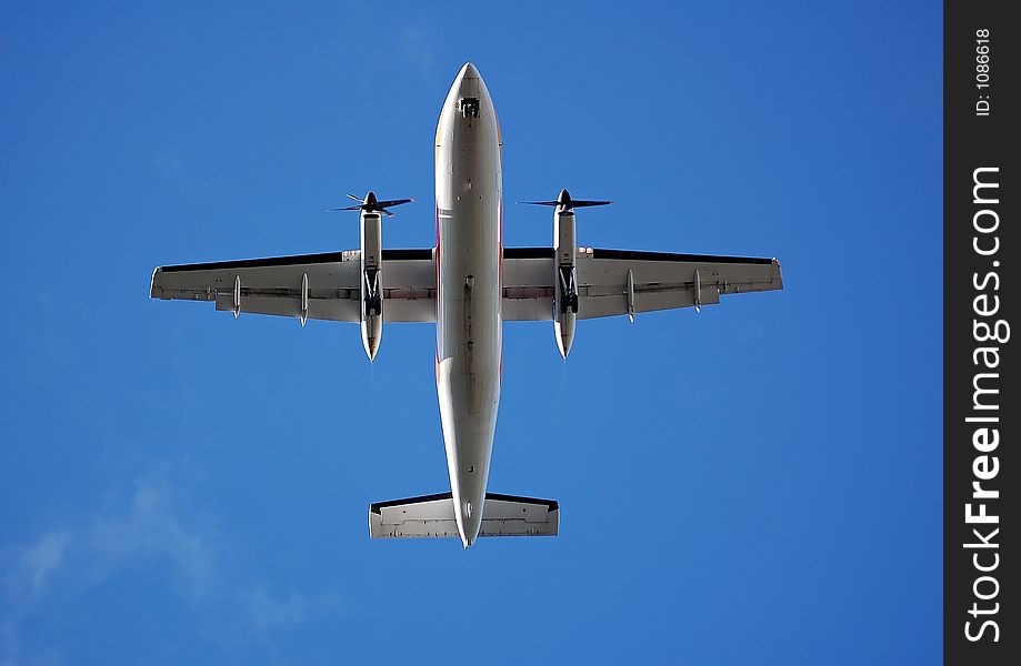 A picture taken directly underneath an aircraft. A picture taken directly underneath an aircraft