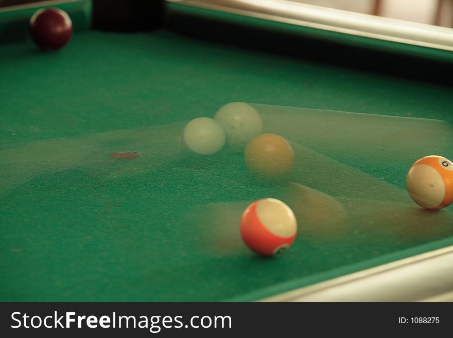 Speedy balls on billiard table - motion blur