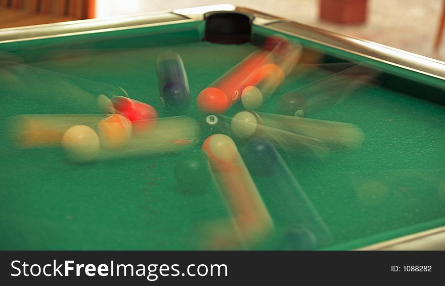 Speedy balls on billiard table - motion blur