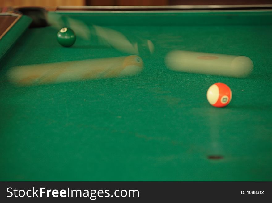 Speedy balls on billiard table - motion blur