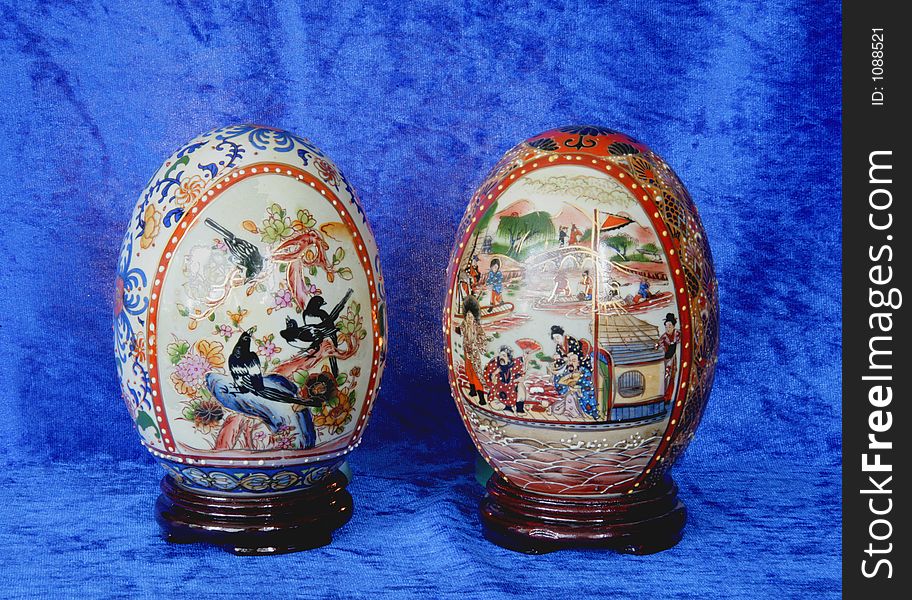 Two china painted eggs. Two china painted eggs