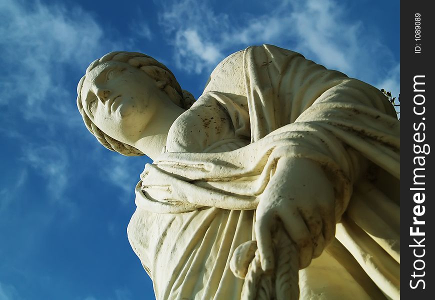 Antique statue and blue sky