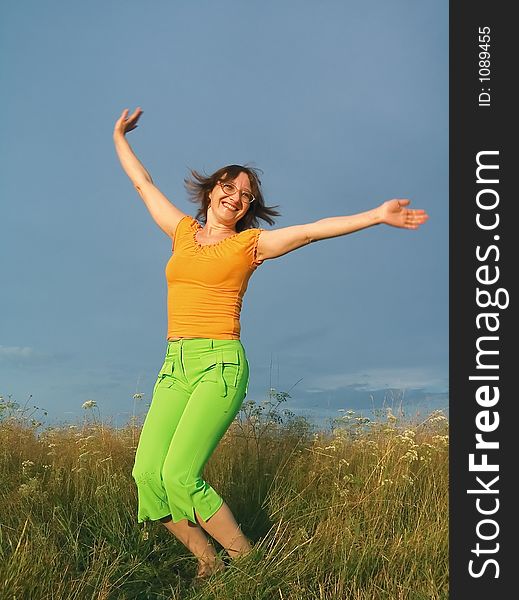 Glad girl in field