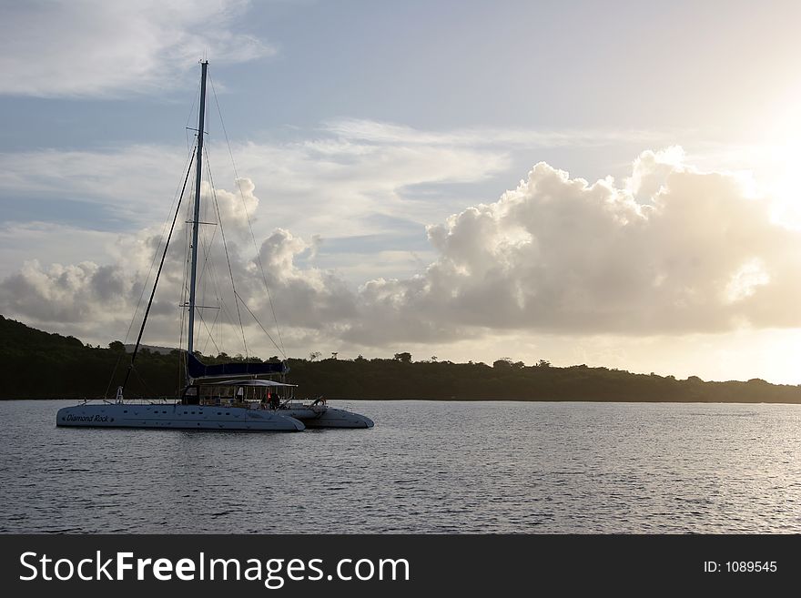 Catamaran photograped at sunset