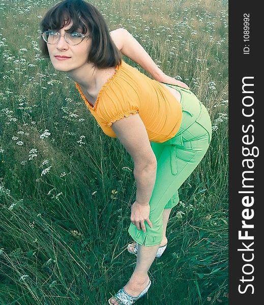 Girl posing on grass. Girl posing on grass