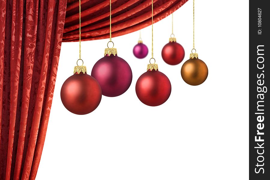 Matte red christmas balls with vivid red curtains. Matte red christmas balls with vivid red curtains