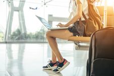 Asian Teenage Girl Is Using A Laptop To Check Email Or Social Network Royalty Free Stock Image