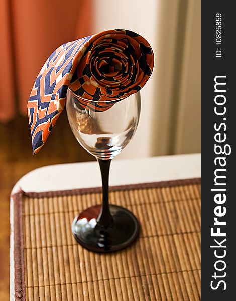 Empty wine glass with a stylish tie. Empty wine glass with a stylish tie.