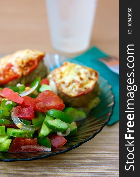 Closeup plate with fresh vegetables, peas and cutlets with cheese. Closeup plate with fresh vegetables, peas and cutlets with cheese