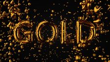 Gold Textured Text Gold With Liquid Drops, Black Background Stock Photos