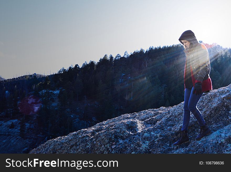 Woman Walking On Mountain