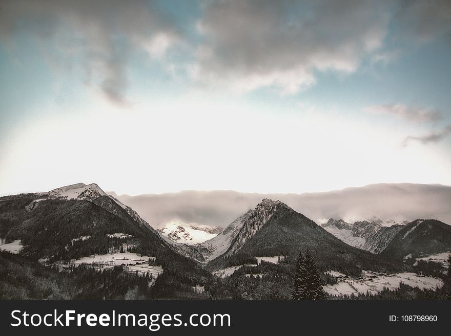 Gray Mountain At Daytime Under Gray Sky