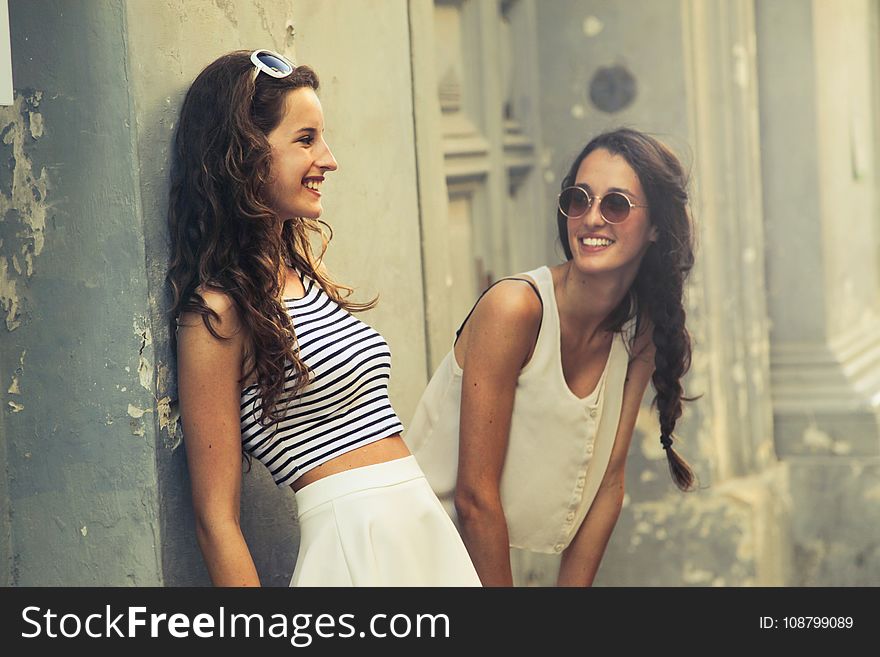 Two Women With White Sunglasses