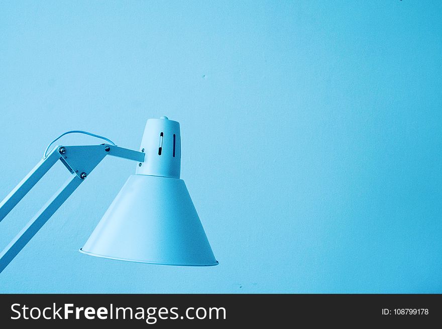 Close-Up Photography of White Desk Lamp