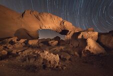 Star Trails Night Landscape Of A Volcanic Rock Arch In Tenerife, Canary Island, Spain. Royalty Free Stock Photography Star Trails Night Landscape Of A Volcanic Rock Arch In Tenerife, Canary Island, Spain. Royalty Free Stock Photography