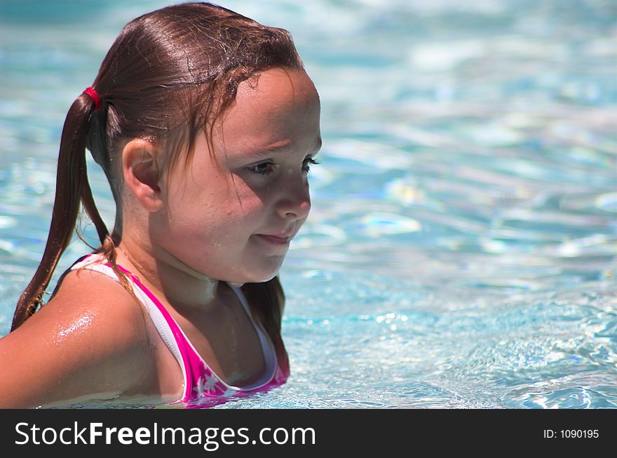 Little Girl in Pool Concentrating. Little Girl in Pool Concentrating