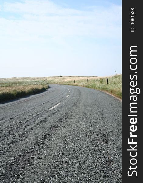 The road from the town on Holy Island towards the causeway. The road from the town on Holy Island towards the causeway.