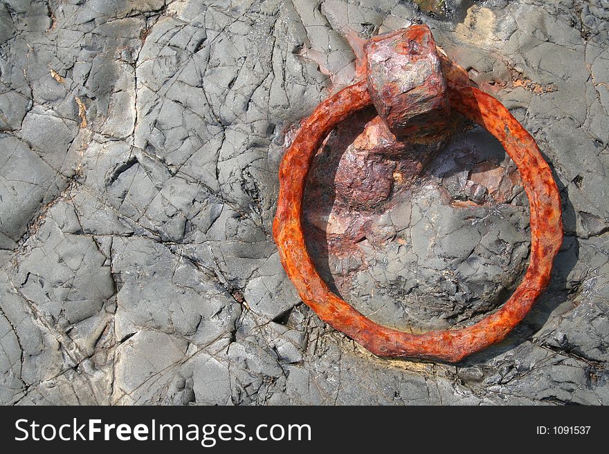 Rusted steel ring at Lindisfarne