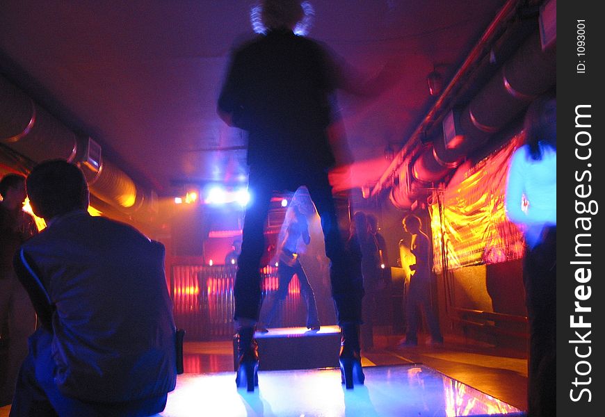 Dancing in the club, girls silhouette