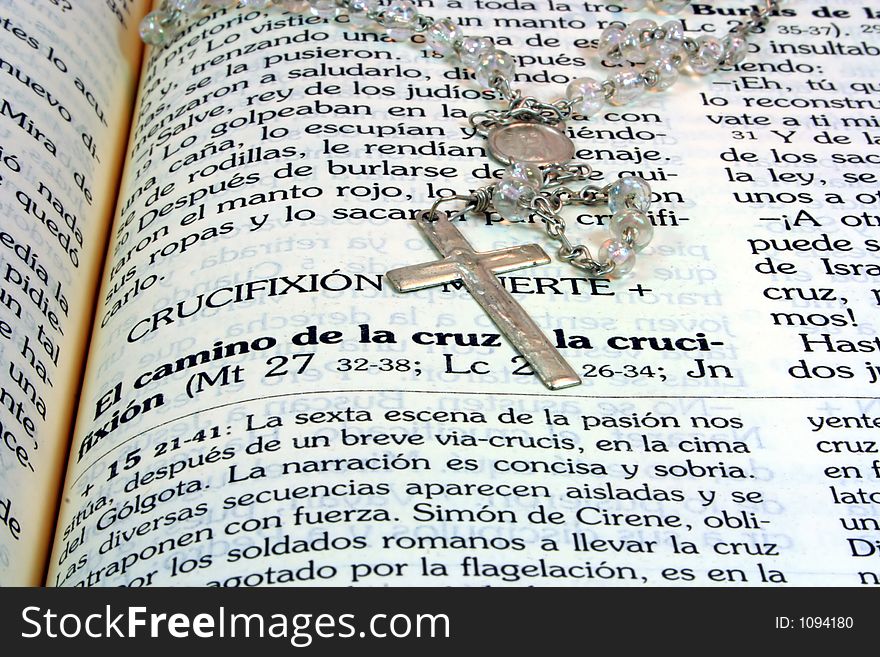 Bible opened with a heart and rosary. Bible opened with a heart and rosary