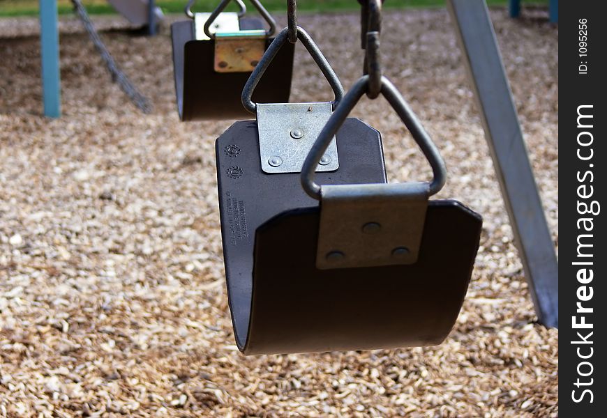 Swings at a playground. Swings at a playground