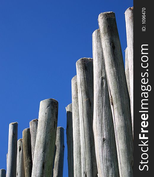 Portrait photo of bleached wood poles. Portrait photo of bleached wood poles.