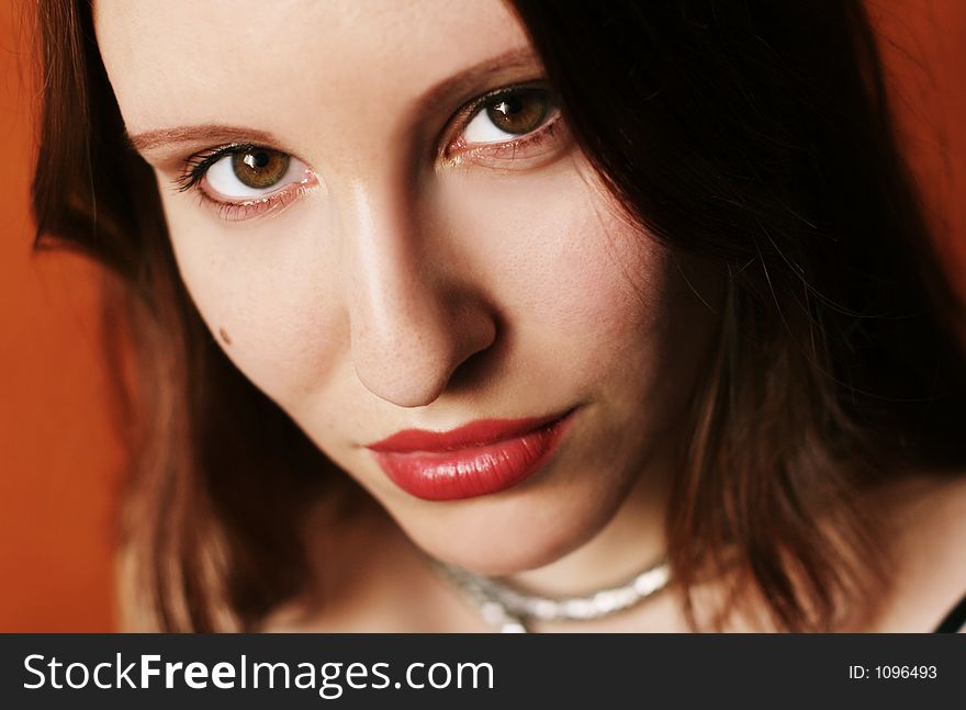 A close-up portrait of a beautiful young woman. A close-up portrait of a beautiful young woman.