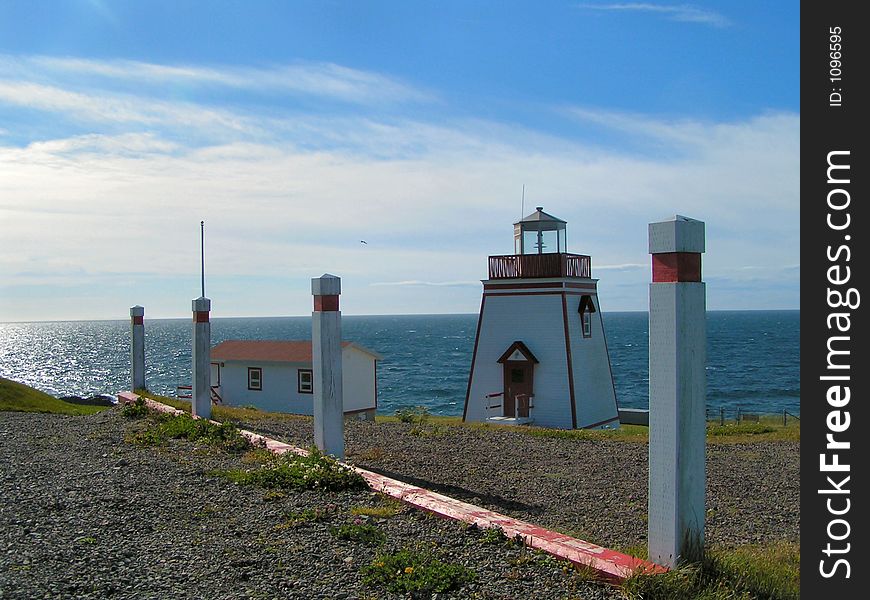 A lighthouse guides warns ships of land