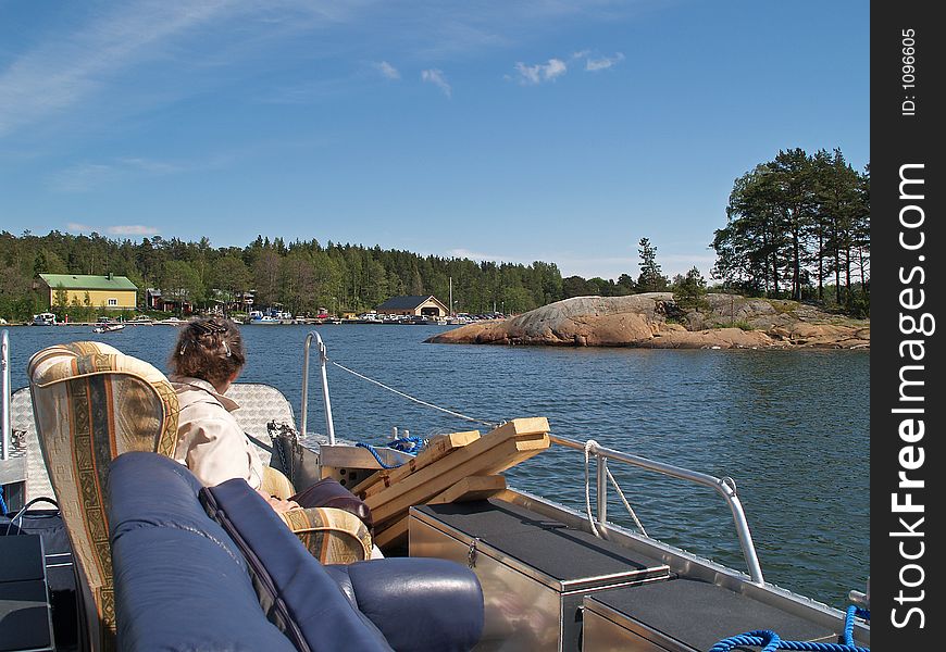 Sea taxi transporting goods in a bay