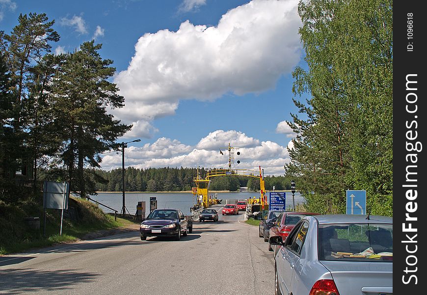 Cars coming from a ferry