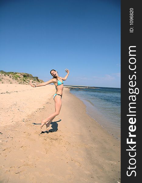 Young woman jumping for joy. Young woman jumping for joy