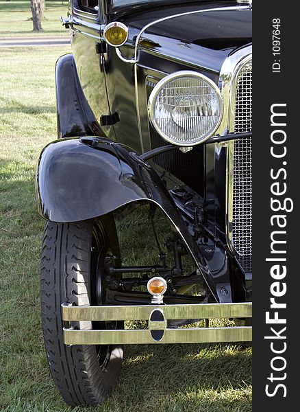 Four door Model A Ford Sedan - front side view, black.