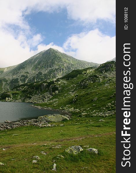 Peak and clouds in Retezat mountains - Romania