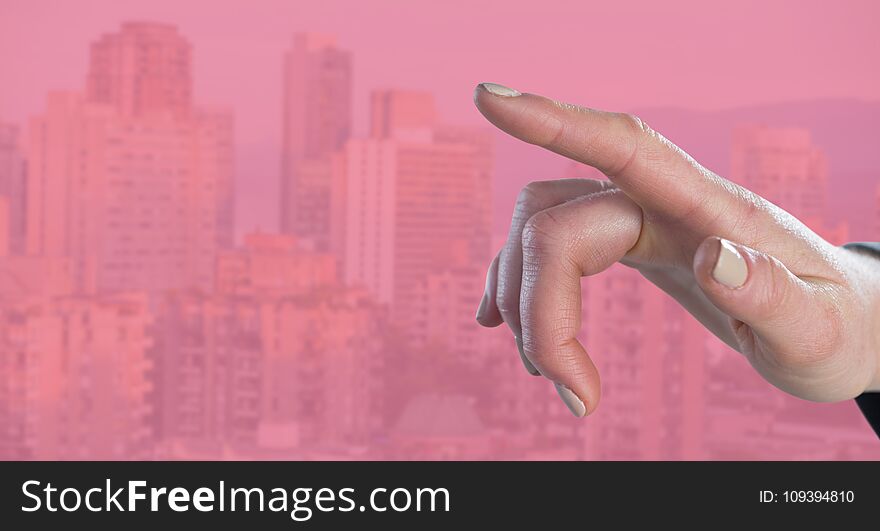 Hand pointing with pink background