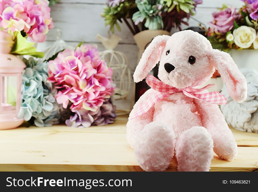 Beautiful interior decoration teddy bear with different home related objects
