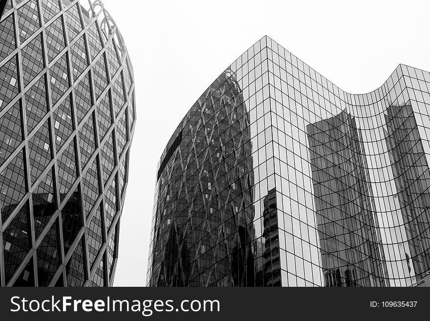 Greyscale Photo Of Glass Window Buildings