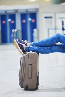 Woman In International Airport Waiting For Her Flight Stock Photography Woman In International Airport Waiting For Her Flight Stock Photography