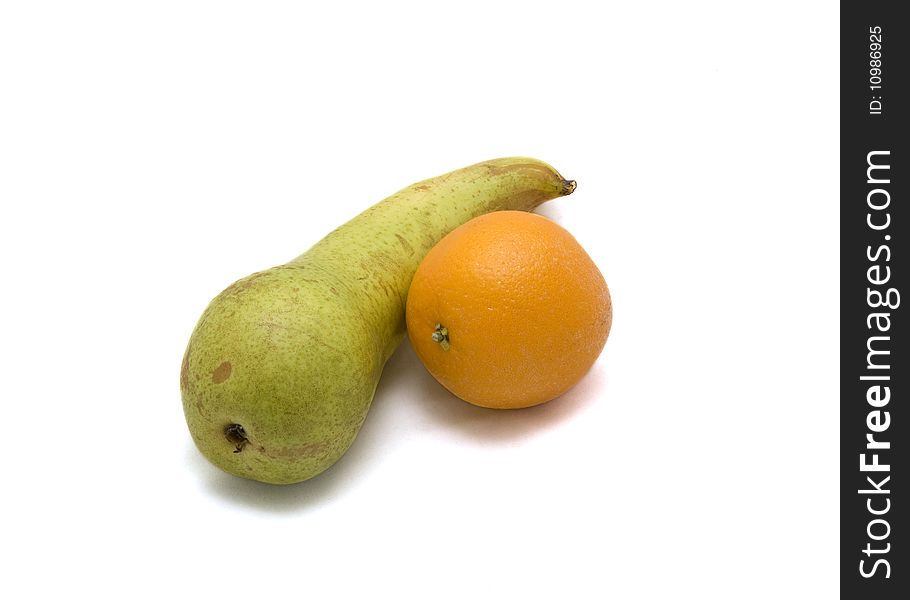 A pear and orange on a white background.