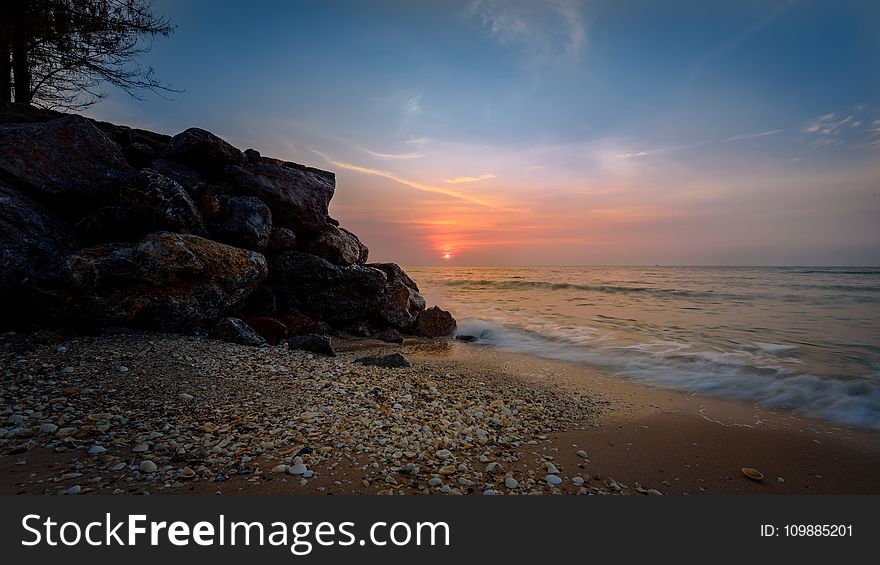 Seashore during Sunset Photography