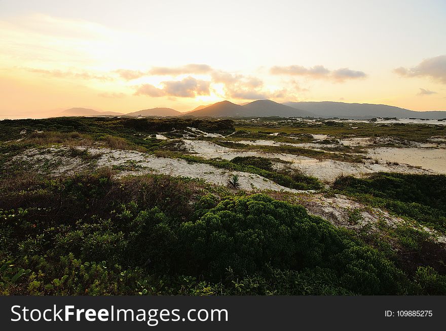 Landscape Photo Of Mountains And Trees Under White Cloudy Sky At Daytime