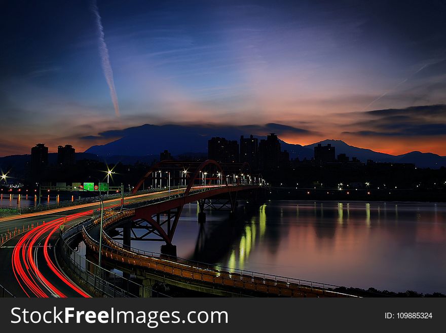 Light Rays On Bridge During Nighttime