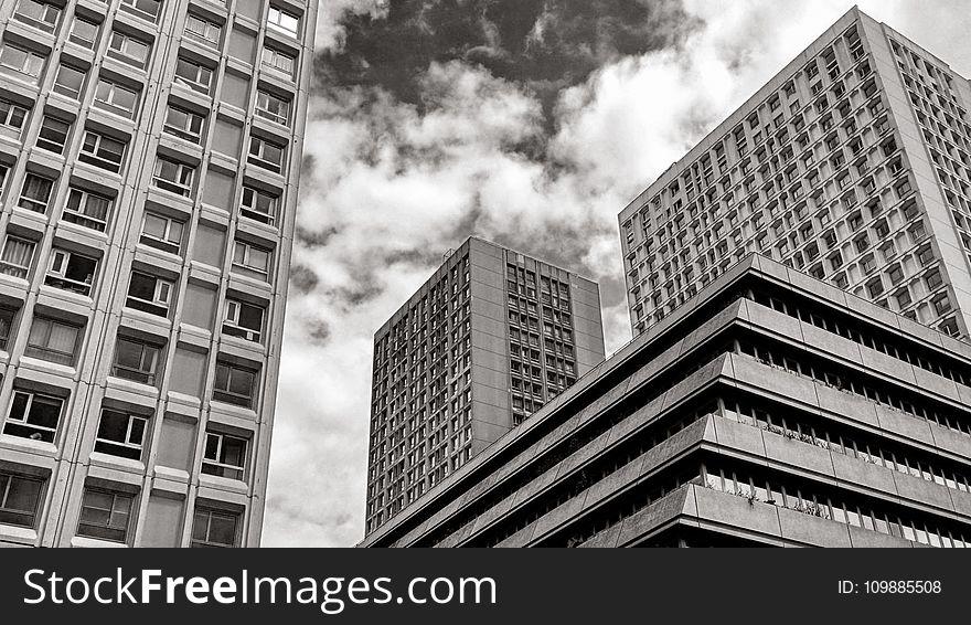 Greyscale Photography of High Rise Building