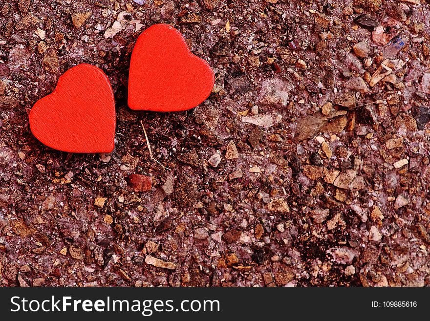 Two Red Heart Decoration On Ground