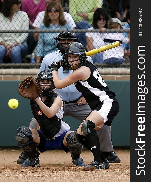 Two Female in Baseball Gears in Stadium Ready to Catch and Swing Baseball