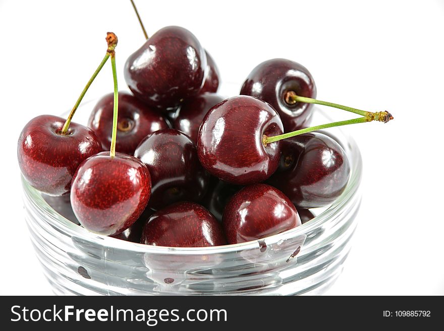 Red Cherry in Clear Glass Bowl