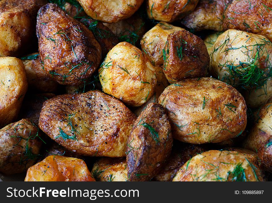 Baked Potatoes With Rosemary Garnish