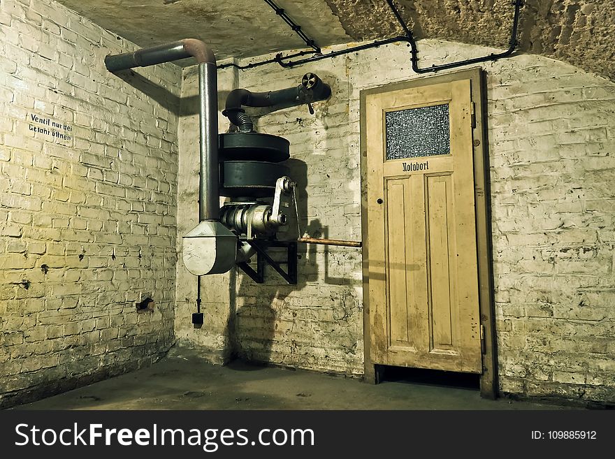 Black and Gray Metal Machine Inside a Room