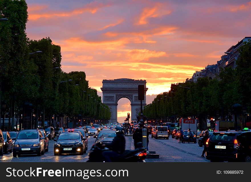 Crowded Street With Cars Along Arc De Triomphe