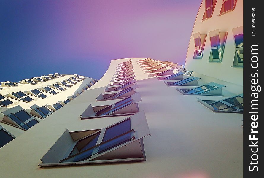 White Building Under Blue Sky